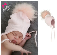 Load image into Gallery viewer, Baby Pompom Chin Tie Hat by Bowtique London